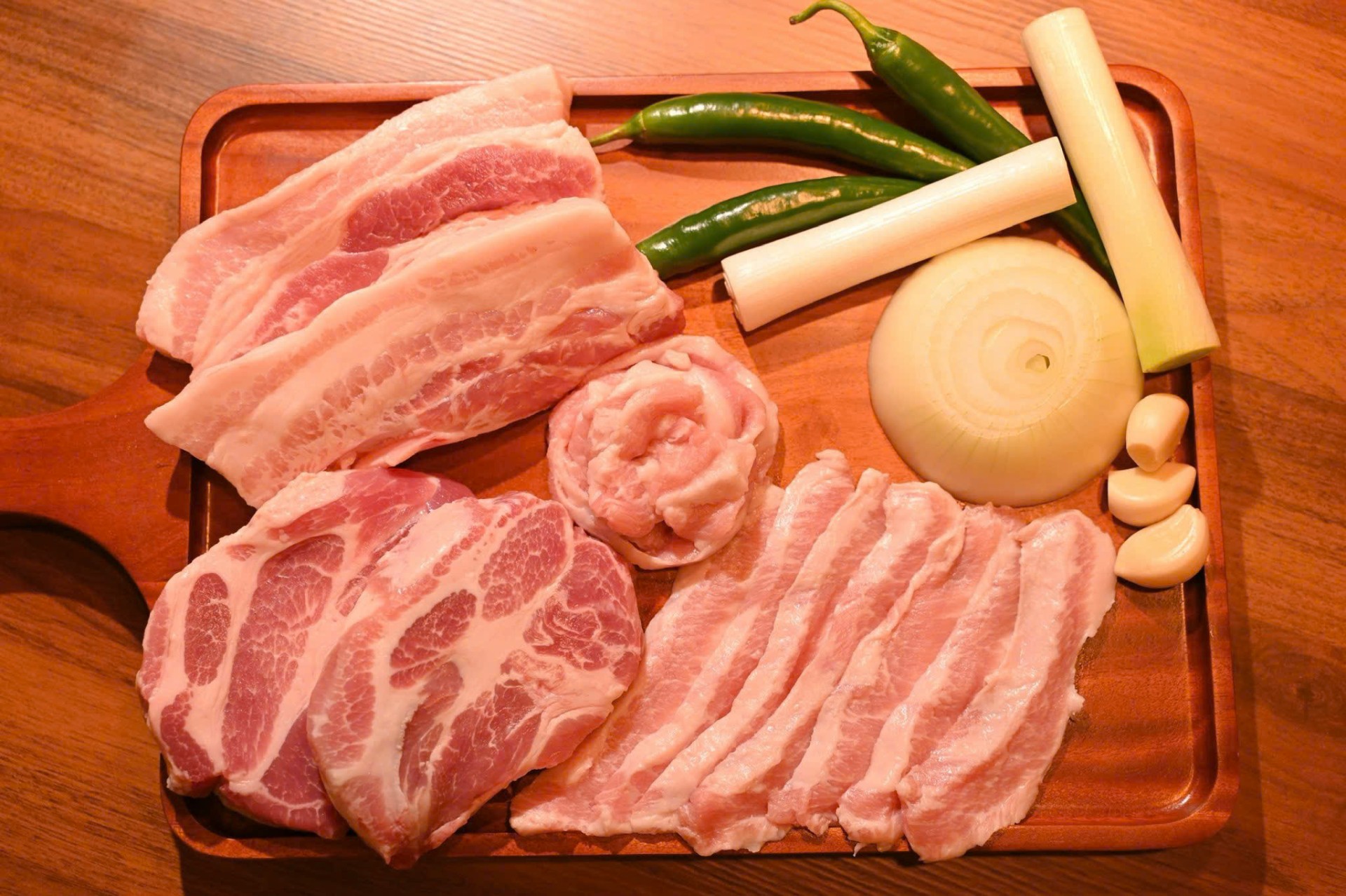 Combo platter with pork belly, pork neck and vegetables