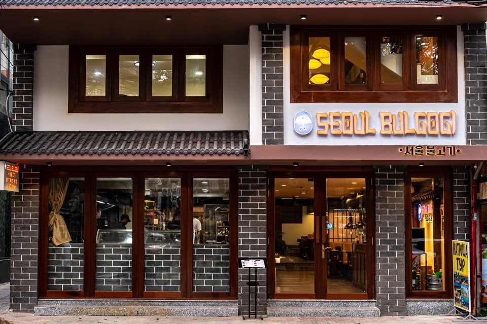 Seoul Bulgogi storefront on Trần Quang Khải — traditional Korean facade with tiled roof and 서울 불고기 signage